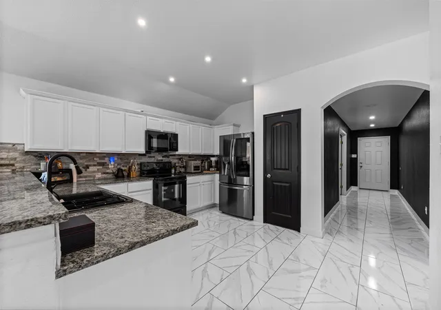 Photo 2 of Single family home for sale at 1612 Ambercrest Dr, Lancaster, TX 75146 | MLS# 21349449 | Listing updated on 2026-10-06