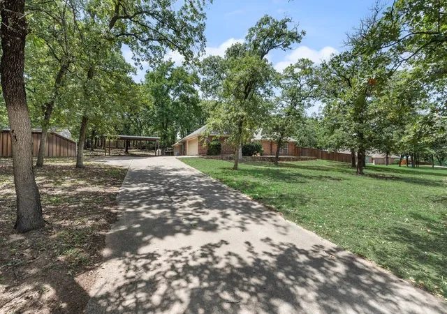 Photo 2 of Single family home for sale at 1022 Oak Tree Dr, Fort Worth, TX 76140 | MLS# 21348740 | Listing updated on 2026-10-07