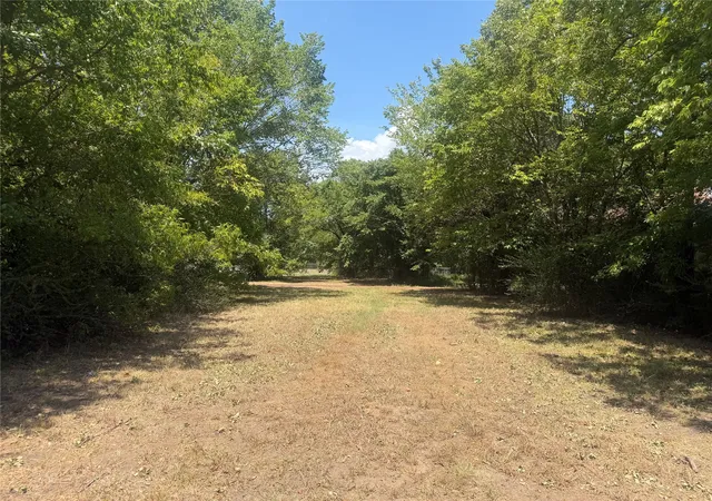 Photo 1 of Land for sale at 704 E Booth Pl, Paris, TX 75460 | MLS# 21348830 | Listing updated on 2026-08-14