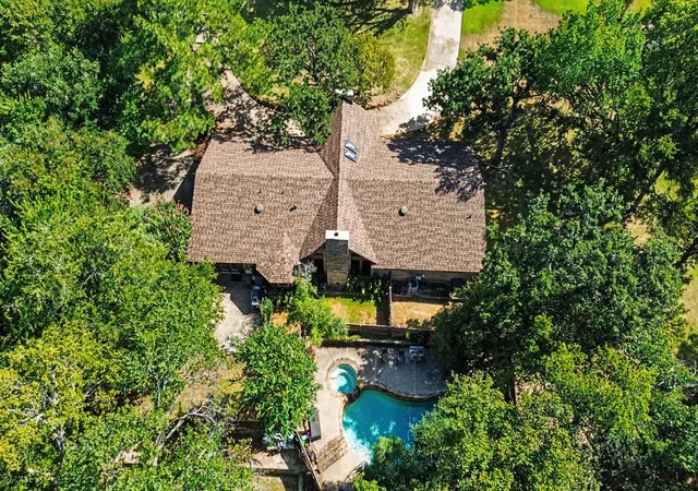 Photo 1 of Single family home for sale at 135 Creekside Dr, Double Oak, TX 75077 | MLS# 21350606 | Listing updated on 2026-09-15