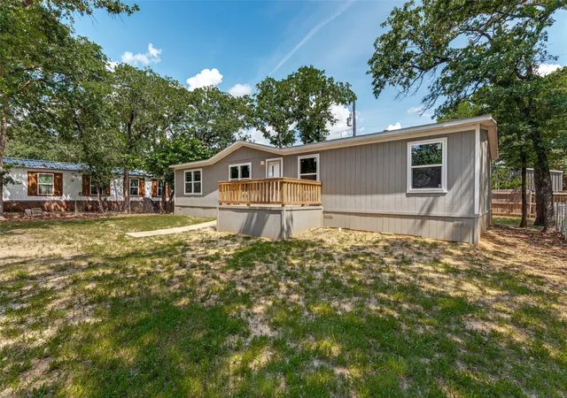 Photo 3 of Single family home for sale at 1613 Mockingbird Ln, Azle, TX 76020 | MLS# 21349681 | Listing updated on 2026-08-16