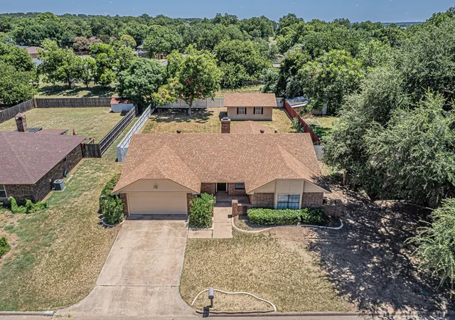 Photo 1 of Single family home for sale at 1015 Meadowlark Ln, Granbury, TX 76048 | MLS# 21349895 | Listing updated on 2026-09-25