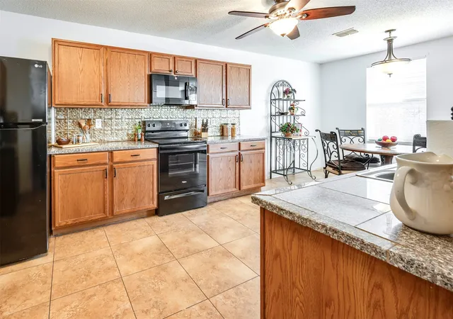 Photo 4 of Single family home for sale at 3214 Friesian Ct, Denton, TX 76210 | MLS# 21349818 | Listing updated on 2026-08-07