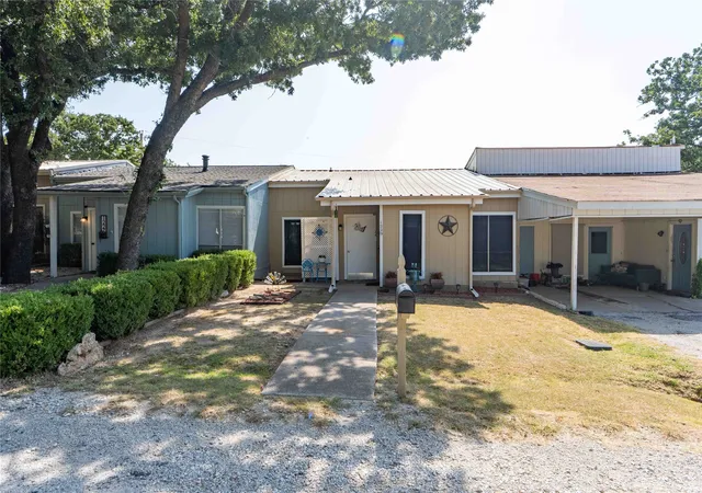 Photo 1 of Townhouse for sale at 1229 Elm Ct, Runaway Bay, TX 76426 | MLS# 21352875 | Listing updated on 2026-08-06