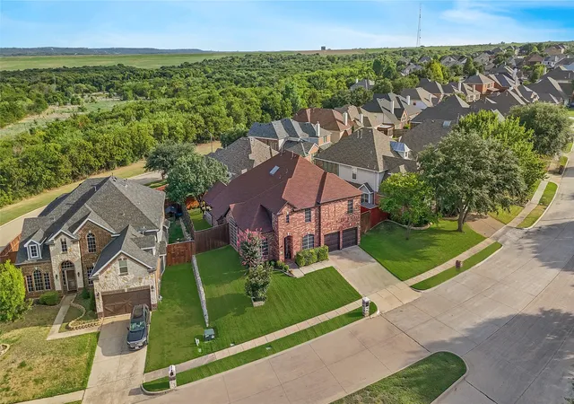 Photo 2 of Single family home for sale at 663 E Sandra Ln, Grand Prairie, TX 75052 | MLS# 21352853 | Listing updated on 2026-08-27