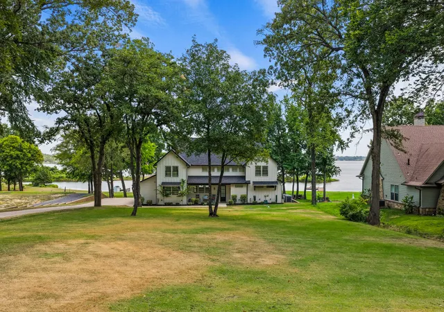 Photo 2 of Single family home for sale at 79 Waters Edge Ln, Scroggins, TX 75480 | MLS# 21352318 | Listing updated on 2026-08-08