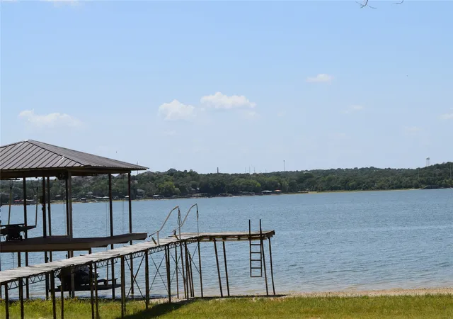 Photo 2 of Single family home for sale at 1411 E Lake Dr, Weatherford, TX 76087 | MLS# 21353930 | Listing updated on 2026-08-08