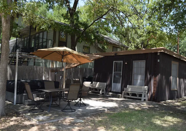 Photo 3 of Single family home for sale at 1411 E Lake Dr, Weatherford, TX 76087 | MLS# 21353930 | Listing updated on 2026-08-08