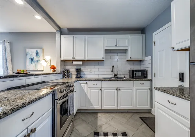 Photo 3 of Townhouse for sale at 13641 Weald Green St, Dallas, TX 75240 | MLS# 21353998 | Listing updated on 2026-09-27