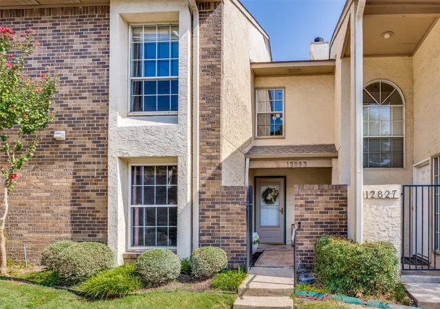 Photo 2 of Townhouse for sale at 12823 Burninglog Ln, Dallas, TX 75243 | MLS# 21350705 | Listing updated on 2026-10-07