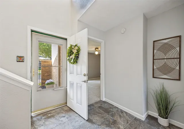 Photo 3 of Townhouse for sale at 12823 Burninglog Ln, Dallas, TX 75243 | MLS# 21350705 | Listing updated on 2026-10-07