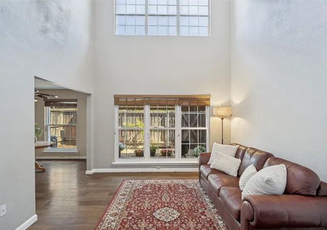 Photo 3 of Townhouse for sale at 12823 Burninglog Ln, Dallas, TX 75243 | MLS# 21350705 | Listing updated on 2026-10-07