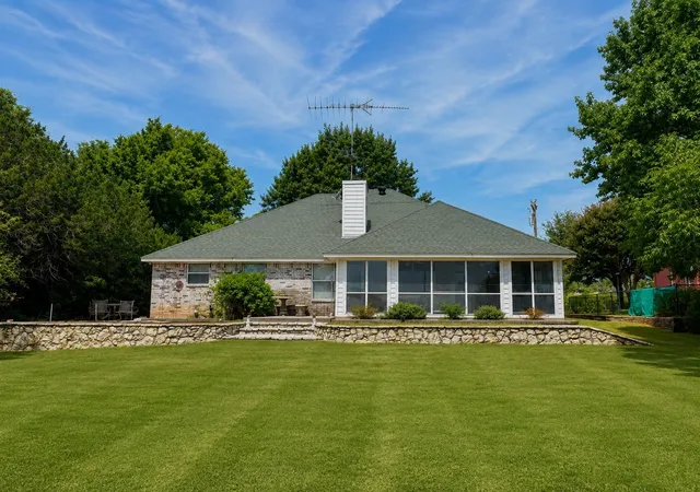 Photo 2 of Single family home for sale at 7066 Golf Dr, Whitney, TX 76692 | MLS# 21342095 | Listing updated on 2026-08-24