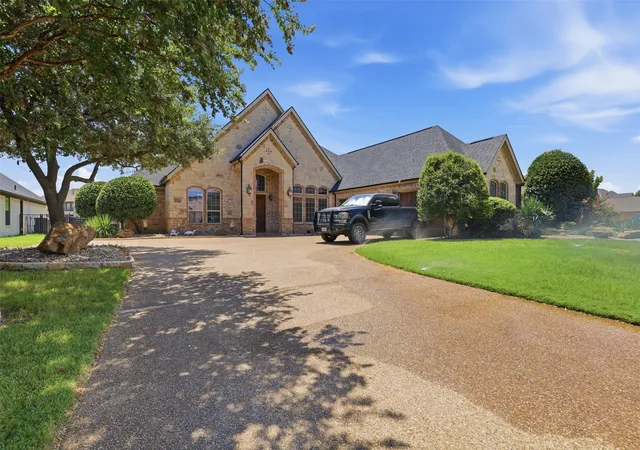 Photo 1 of Single family home for sale at 2606 Waters Edge Dr, Granbury, TX 76048 | MLS# 21352312 | Listing updated on 2026-08-10