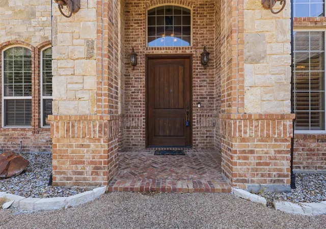 Photo 3 of Single family home for sale at 2606 Waters Edge Dr, Granbury, TX 76048 | MLS# 21352312 | Listing updated on 2026-08-10