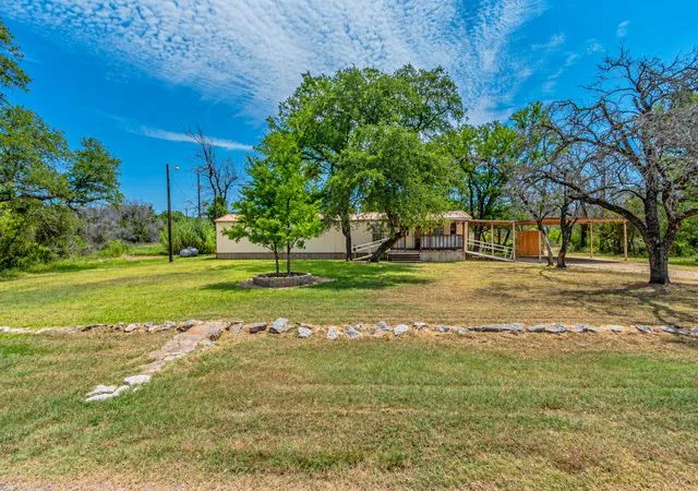 Photo 1 of Manufactured home for sale at 4217 Cottonwood Dr, Granbury, TX 76048 | MLS# 21349179 | Listing updated on 2026-10-07