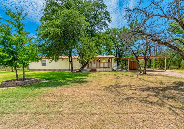 Photo 2 of Manufactured home for sale at 4217 Cottonwood Dr, Granbury, TX 76048 | MLS# 21349179 | Listing updated on 2026-10-07