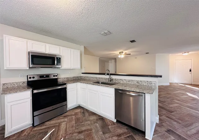 Photo 3 of Single family home for sale at 1418 Mill Branch Dr, Garland, TX 75040 | MLS# 21354068 | Listing updated on 2026-10-07