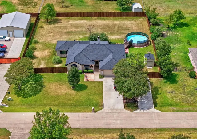 Photo 2 of Single family home for sale at 107 Cottonwood Dr, Fate, TX 75189 | MLS# 21356578 | Listing updated on 2026-09-05