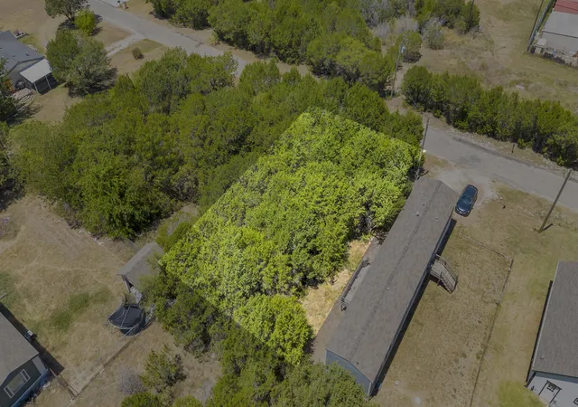 Photo 1 of Land for sale at 915 Bosque River Dr, Granbury, TX 76048 | MLS# 21355147 | Listing updated on 2026-08-24