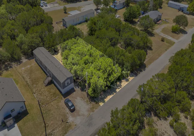 Photo 4 of Land for sale at 915 Bosque River Dr, Granbury, TX 76048 | MLS# 21355147 | Listing updated on 2026-08-24
