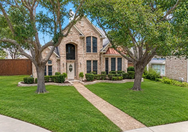 Photo 1 of Single family home for sale at 122 Ridgewood Dr, Coppell, TX 75019 | MLS# 21357726 | Listing updated on 2026-10-07