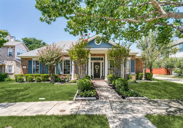 Photo 1 of Sale Pending at 1702 Bluffview Ln, Carrollton, TX 75007 | MLS# 21360088 | Listing updated on 2026-10-08