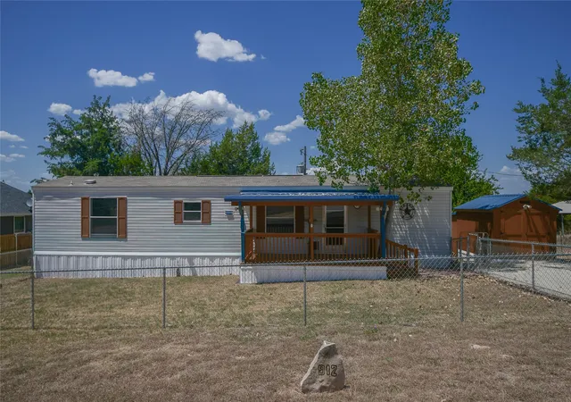 Photo 2 of Manufactured home for sale at 912 Pease River Dr, Granbury, TX 76048 | MLS# 21358233 | Listing updated on 2026-08-23