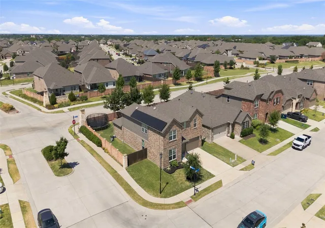Photo 3 of Single family home for sale at 703 Liner Ln, Rockwall, TX 75087 | MLS# 21363425 | Listing updated on 2026-08-22