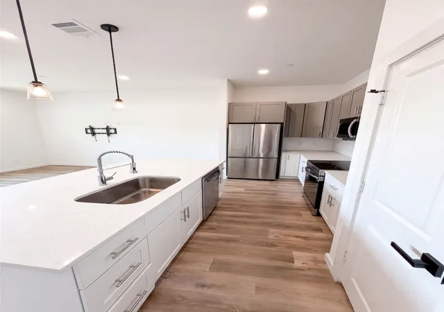 Photo 2 of Townhouse for sale at 1020 17th St, Plano, TX 75074 | MLS# 21366329 | Listing updated on 2026-10-07
