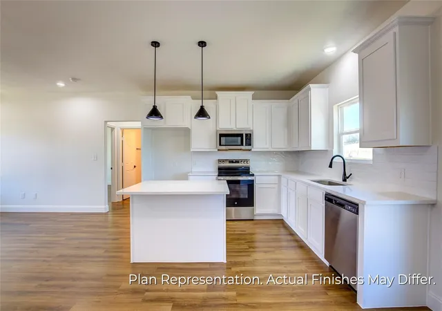 Photo 4 of Single family home for sale at 205 E Laura Ave, Quinlan, TX 75474 | MLS# 21366392 | Listing updated on 2026-08-22
