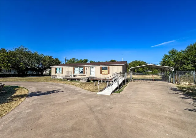 Photo 2 of Manufactured home for sale at 105 N Avenue L, Haskell, TX 79521 | MLS# 21363361 | Listing updated on 2026-08-22