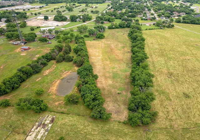 Photo 3 of Land for sale at 00 N Washington St, Pilot Point, TX 76258 | MLS# 21366748 | Listing updated on 2026-09-02
