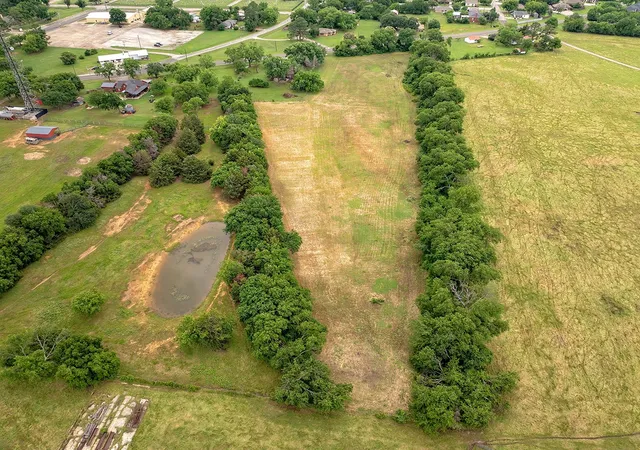 Photo 3 of Land for sale at 00 N Washington St, Pilot Point, TX 76258 | MLS# 21366748 | Listing updated on 2026-09-02