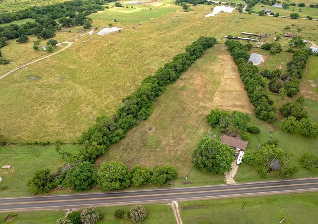 Photo 4 of Land for sale at 00 N Washington St, Pilot Point, TX 76258 | MLS# 21366748 | Listing updated on 2026-09-02