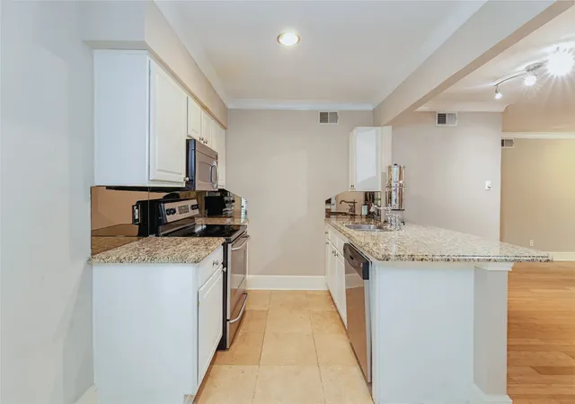 Photo 3 of Condo for sale at 10111 Regal Park Ln #208, Dallas, TX 75230 | MLS# 21366506 | Listing updated on 2026-09-22