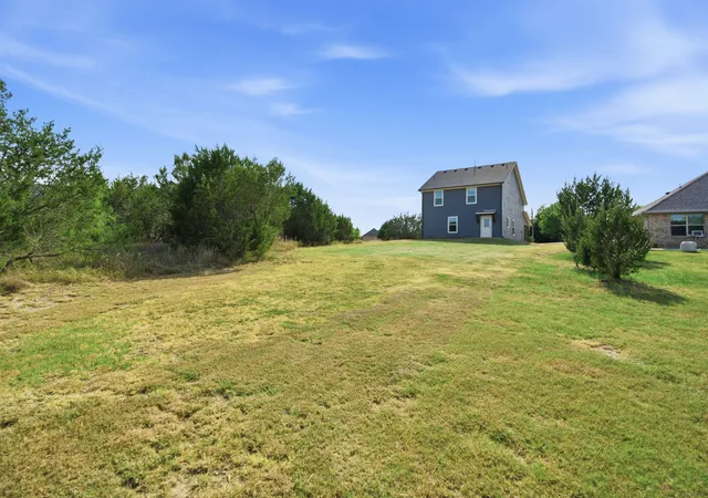 Photo 3 of Single family home for sale at 5101 Santa Fe St, Granbury, TX 76048 | MLS# 21365223 | Listing updated on 2026-10-06