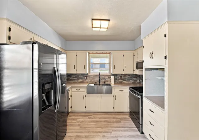 Photo 4 of Single family home for sale at 2022 Normandy Dr, Irving, TX 75060 | MLS# 21363261 | Listing updated on 2026-08-29