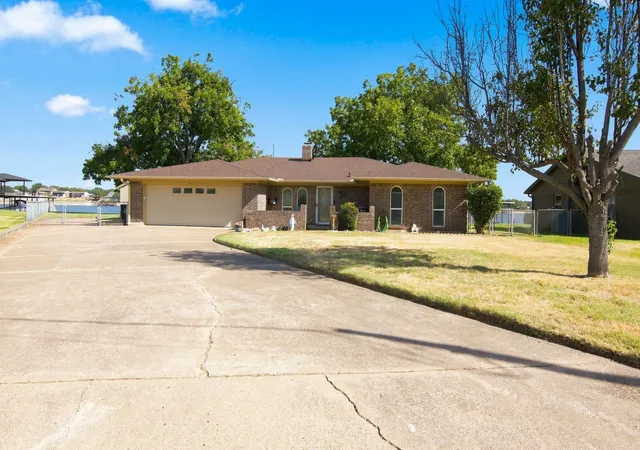 Photo 1 of Single family home for sale at 504 Panama Ct, Granbury, TX 76048 | MLS# 21368482 | Listing updated on 2026-08-25