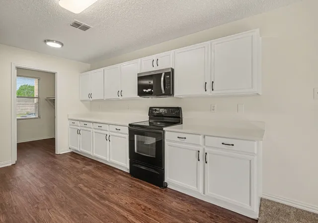 Photo 4 of Single family home for sale at 1404 Sunflower Ct, Burleson, TX 76028 | MLS# 21367574 | Listing updated on 2026-08-26