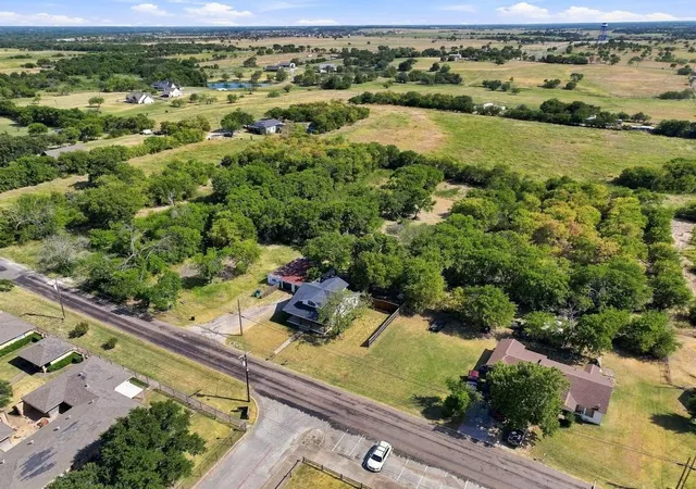 Photo 1 of Single family home for sale at 405 E College St, Gunter, TX 75058 | MLS# 21355438 | Listing updated on 2026-10-07