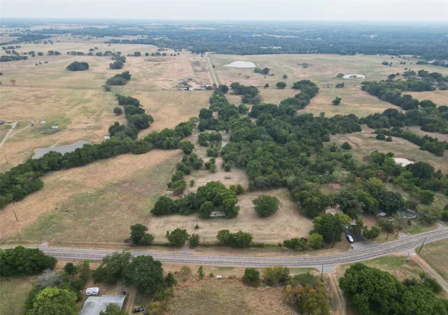 Photo 3 of Land for sale at 404 E Maple St, Ravenna, TX 75476 | MLS# 21373545 | Listing updated on 2026-10-06