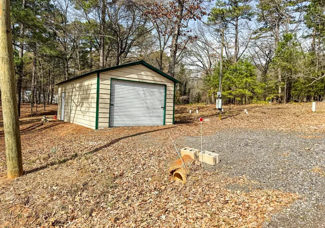 Photo 3 of Single family home for sale at 670 Redbud Dr, Avinger, TX 75630 | MLS# 21374771 | Listing updated on 2026-09-02