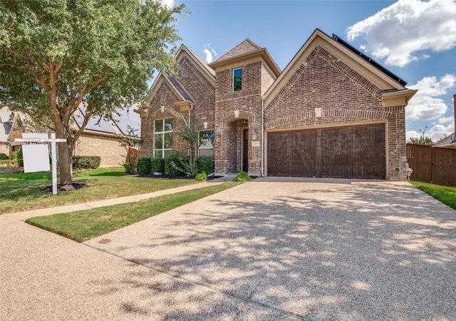 Photo 1 of Single family home for sale at 703 Waterlane Dr, Mansfield, TX 76063 | MLS# 21375704 | Listing updated on 2026-10-06