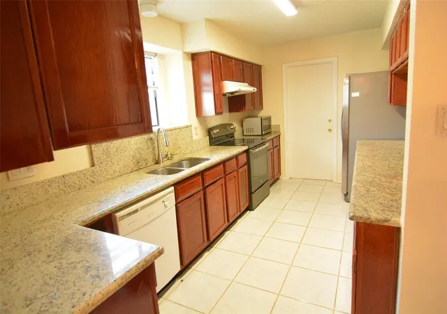 Photo 2 of Single family home for sale at 210 W Apollo Rd, Garland, TX 75040 | MLS# 21376497 | Listing updated on 2026-09-24