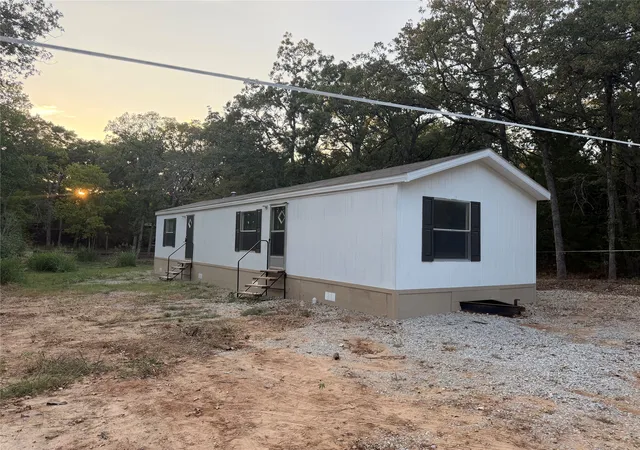 Photo 1 of Manufactured home for sale at 9374 Amy Dr, Quinlan, TX 75474 | MLS# 21376814 | Listing updated on 2026-10-05