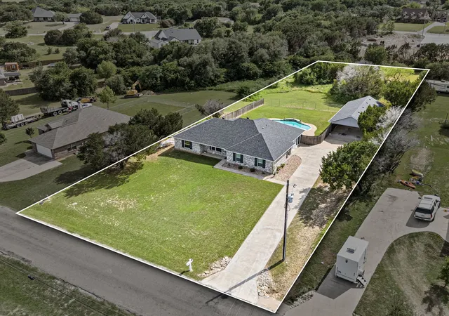 Photo 1 of Single family home for sale at 4000 Goliad Dr, Granbury, TX 76048 | MLS# 21376622 | Listing updated on 2026-10-06