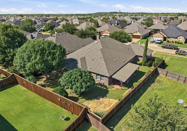 Photo 3 of Single family home for sale at 305 Delaware St, Burleson, TX 76028 | MLS# 21332167 | Listing updated on 2026-09-04