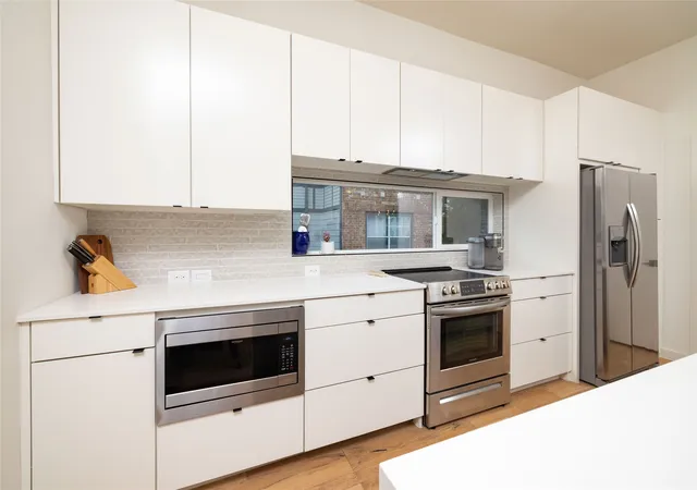 Photo 2 of Condo for sale at 2118 N Carroll Ave #101, Dallas, TX 75204 | MLS# 21372893 | Listing updated on 2026-09-28