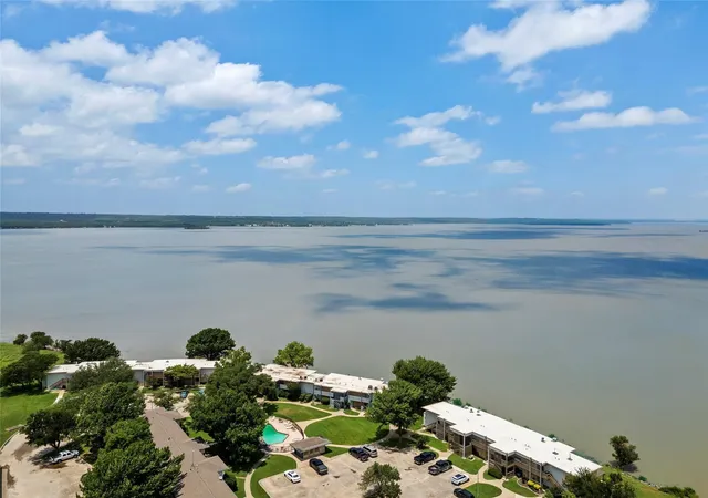 Photo 1 of Condo for sale at 109 Harbor Dr #105, Bridgeport, TX 76426 | MLS# 21377917 | Listing updated on 2026-10-07
